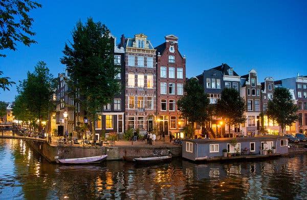 Houses line the central canals of Amsterdam’s city center.
